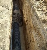 اصلاح نقطه بحرانی شبکه فاضلاب در کوی ملت اهواز